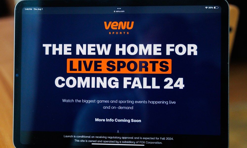 The Venu Sports website seen on an iPad.