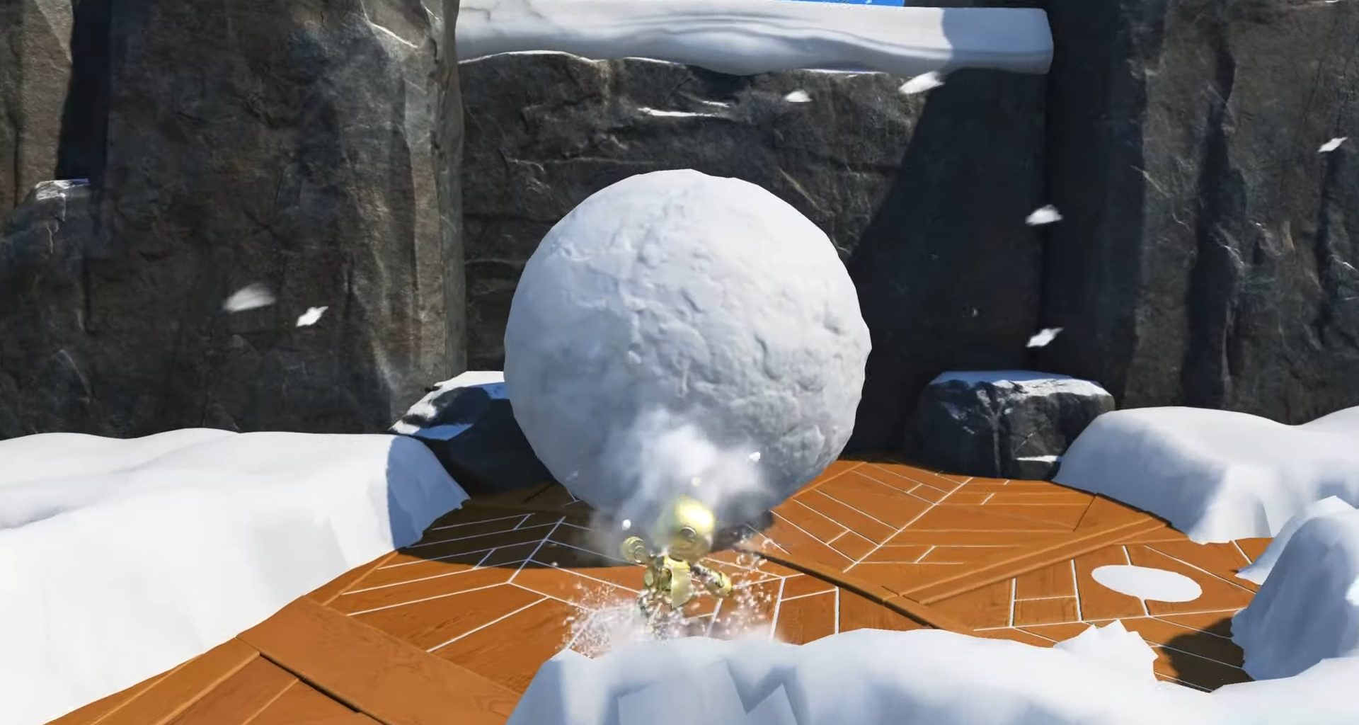 Astro bot fazendo uma grande bola de neve.