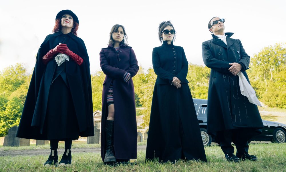 Catherine O'Hara, Jenna Ortega, Winona Ryder, and Justin Theroux stand in a cemetery in Beetlejuice Beetlejuice.