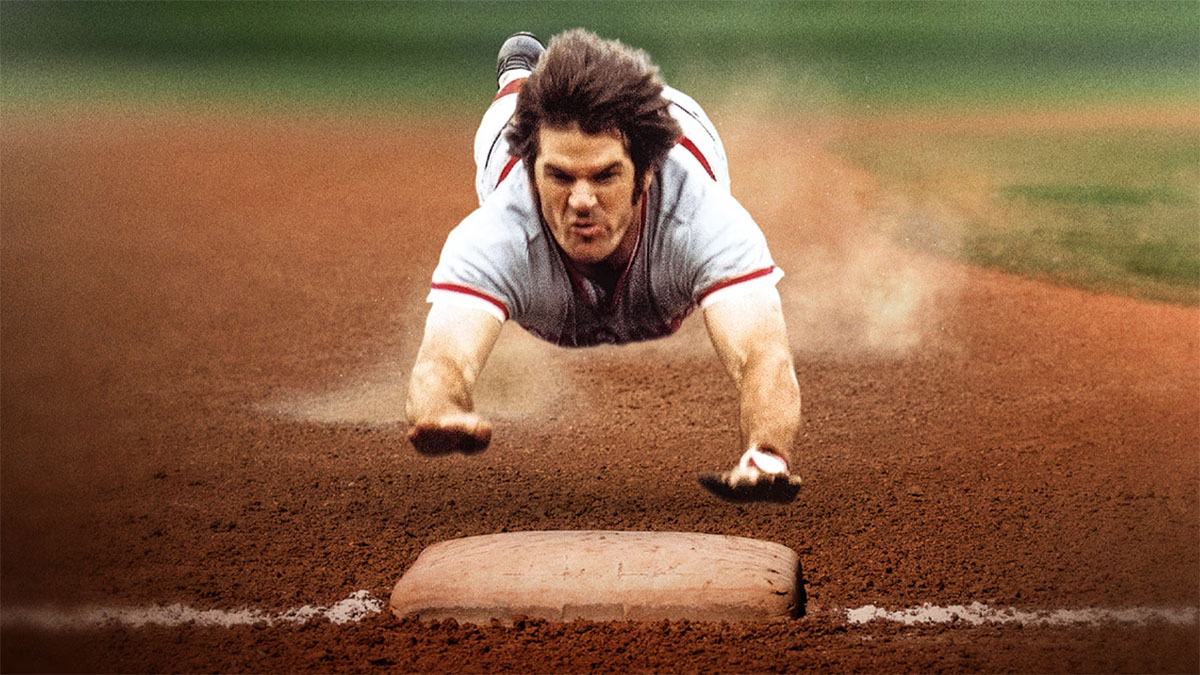 Pete Rose slides for a base in promo art for Charlie Hustle & the Matter of Pete Rose.