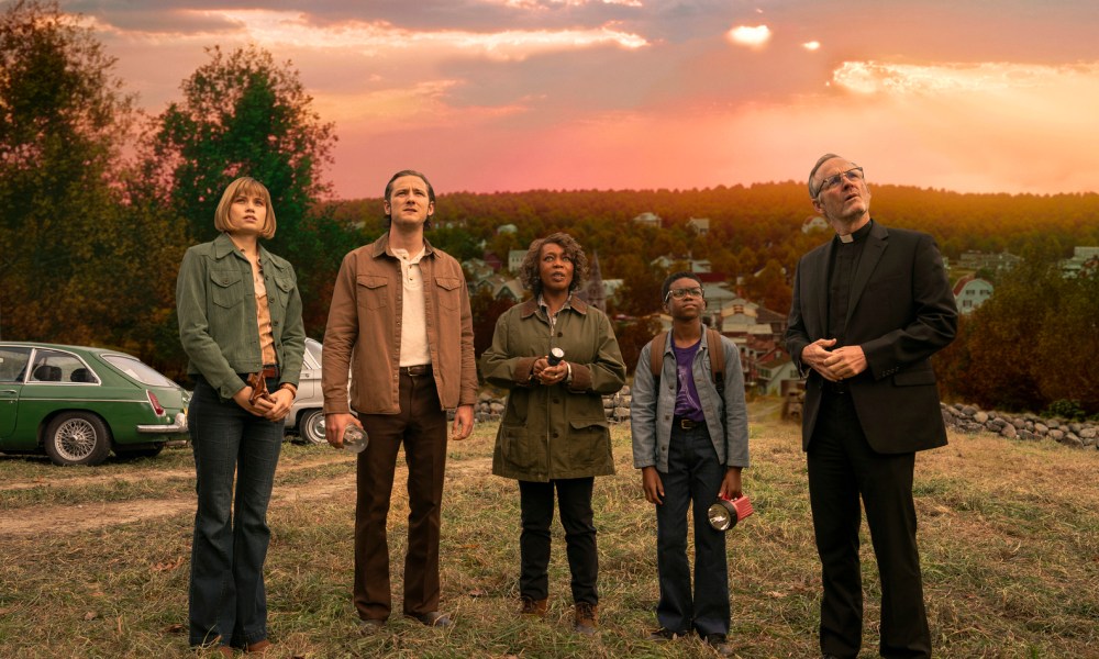 Five survivors stand on a hill together in Salem's Lot.