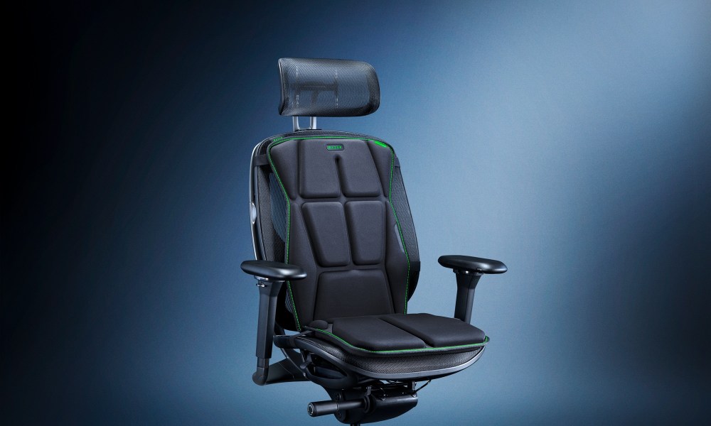 The Razer Freyja cushion strapped to a chair.