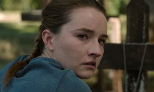 Kaitlyn Dever cries near a grave in The Last of Us season 2.