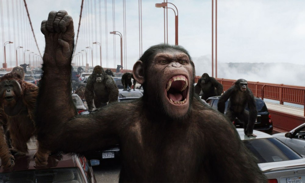 Caesar raises his fist in a climatic fight in Rise of the Planet of the Apes.