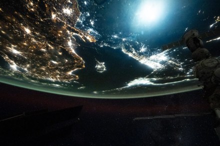 Astronaut captures a meteor exploding in the atmosphere over Earth