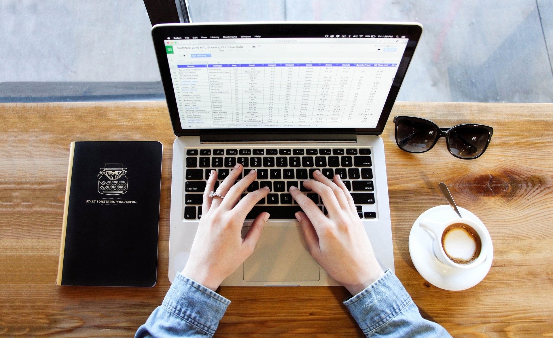 Spreadsheet on a laptop on a desk.