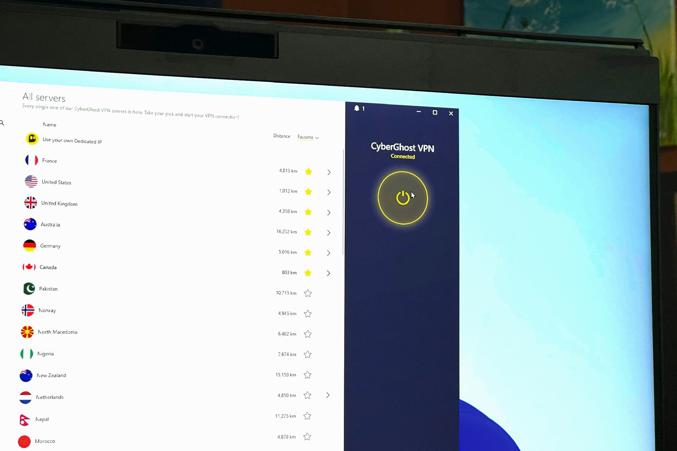 cyberghost vpn review the app is open and showing servers on a pc monitor