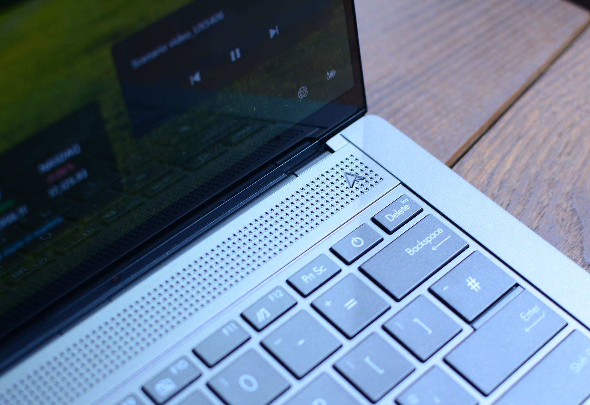 The unique geometric CNC-machined cooling vents on the Asus ZenBook S14 late 2024 model.