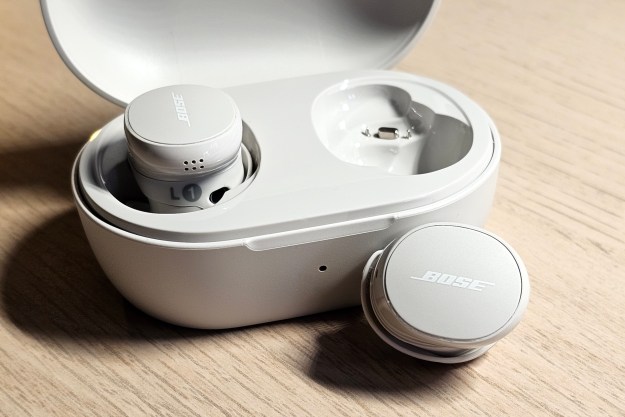 Bose QuietComfort Earbuds (2024): charging case (open, one earbud out of the case).