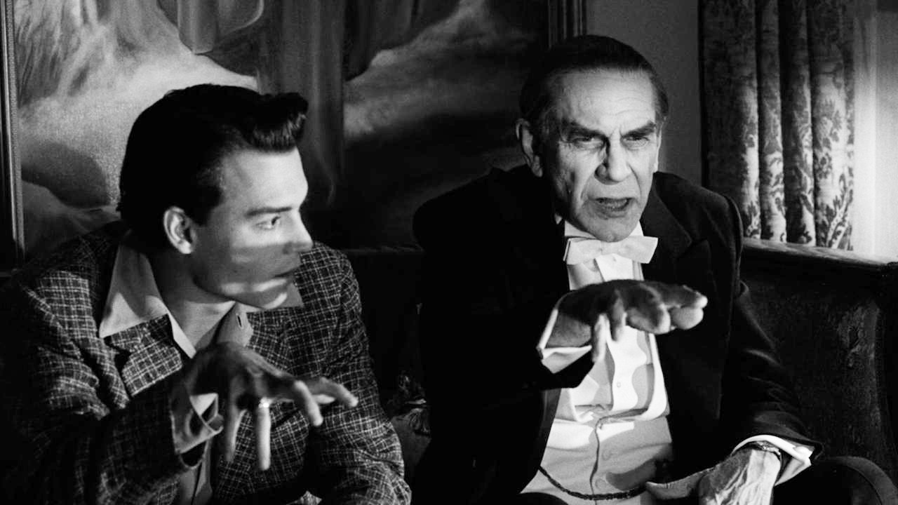 Two men watch a movie in Ed Wood.