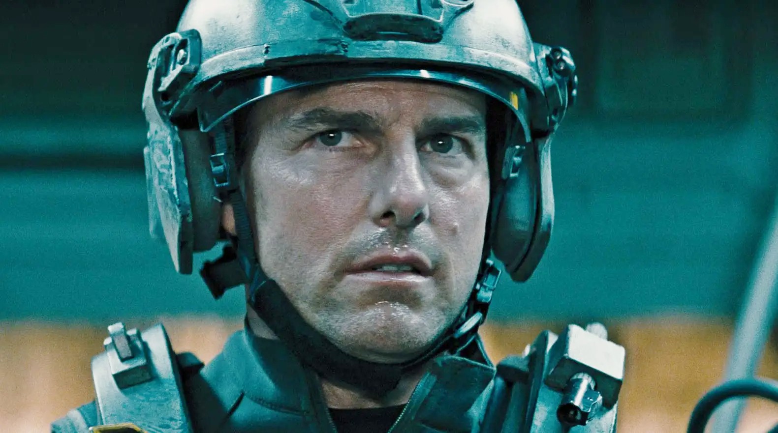 A man in gear looks ahead in Edge of Tomorrow.