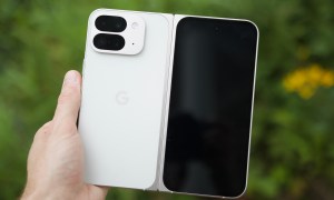 Someone holding the Google Pixel 9 Pro Fold, showing the back of the phone.