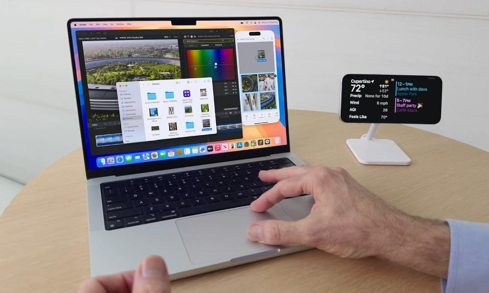 Apple's Craig Federighi demonstrates the iPhone Mirroring feature in macOS Sequoia at the Worldwide Developers Conference (WWDC) in June 2024.