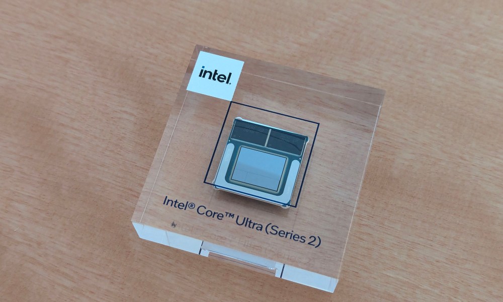 An Intel Core Ultra Series 2 chip embedded in a piece of glass.