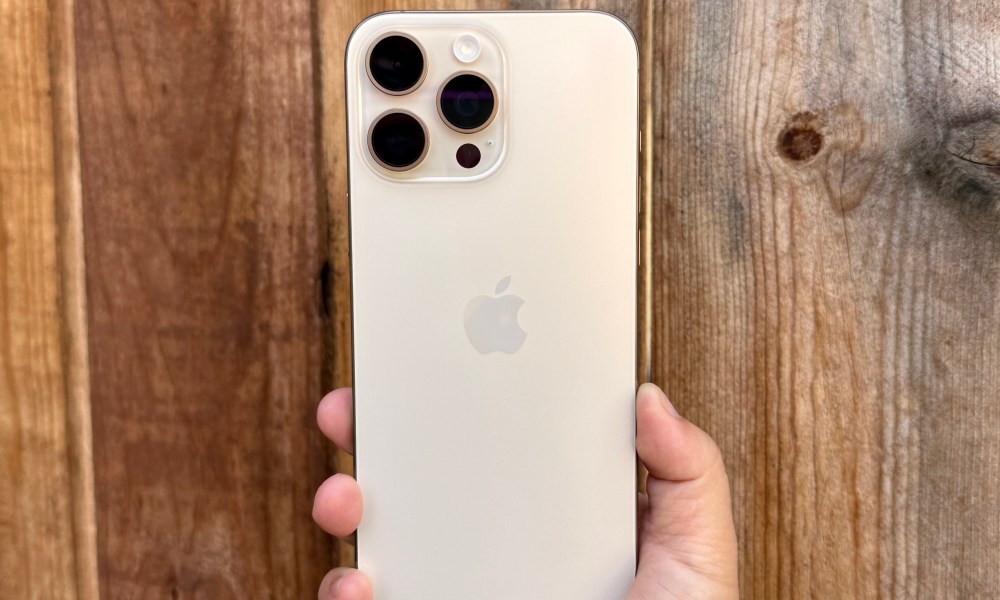 iPhone 16 Pro Max in Desert Titanium.