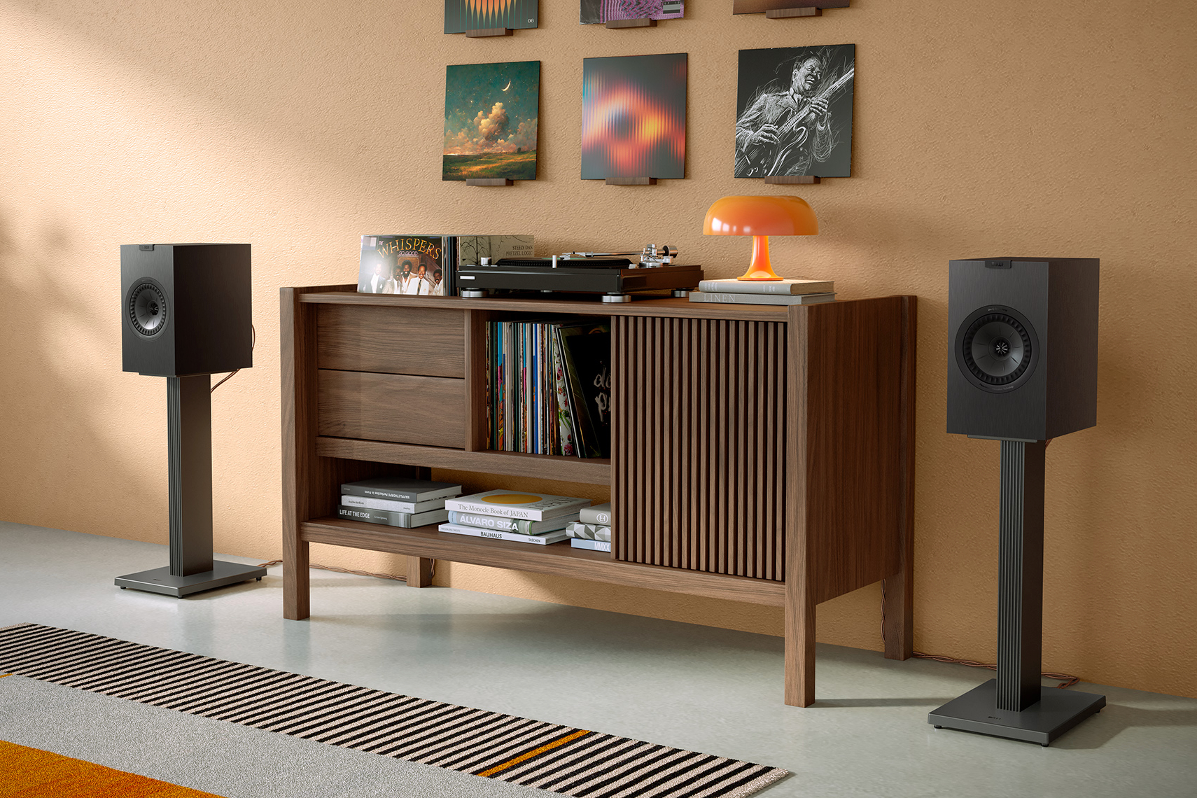 The KEF Q3 Meta speakers with a turnable.