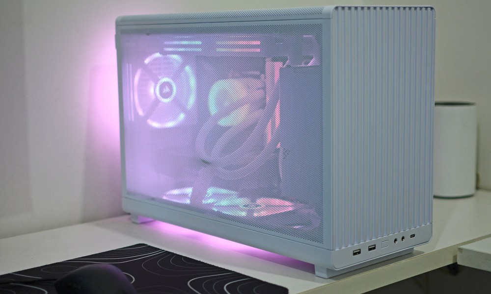 The Lian Li A3-mATX case in white with mesh side panel.