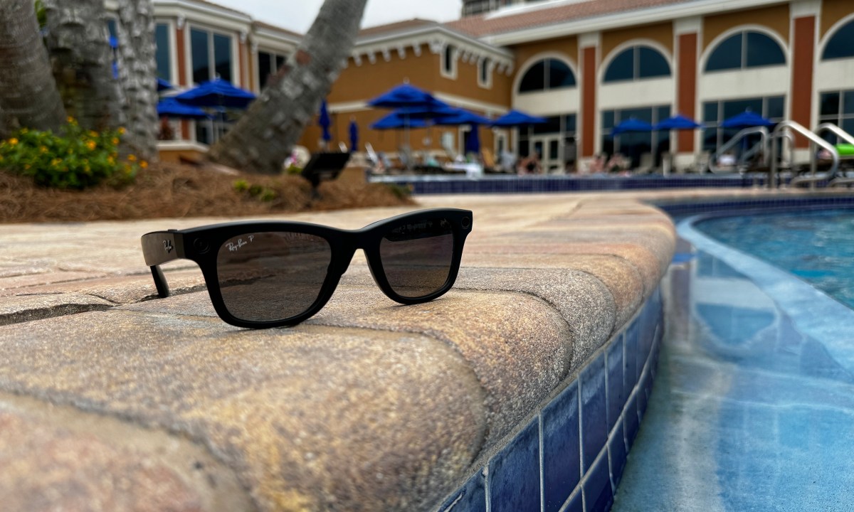 The Ray-Ban Meta smart glasses next to a pool.