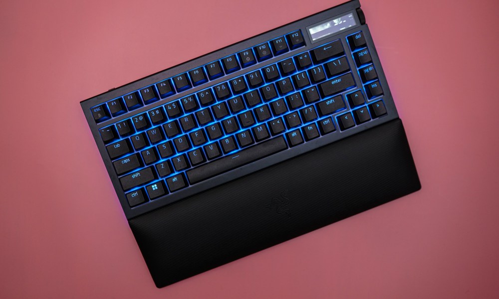 The Razer Black Widow V4 Pro 75% sitting on a pink background.