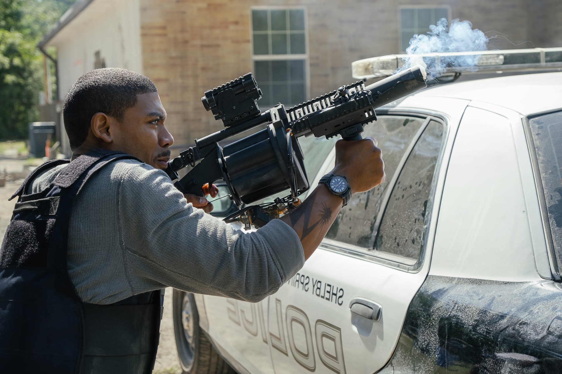 A man fires a gun in Rebel Ridge.