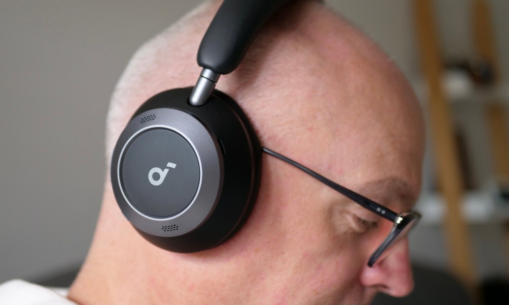 A person wearing the Soundcore Space One Pro headphones.