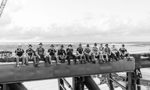 SpaceX engineers high above the company's Starbase facility in Boca Chica, Texas.