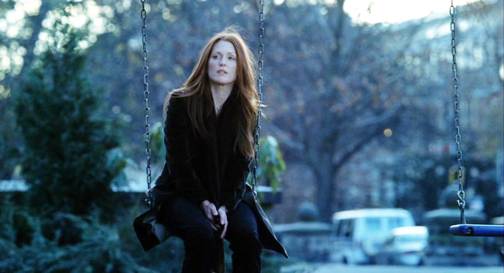 A woman sits in a park in The Forgotten.