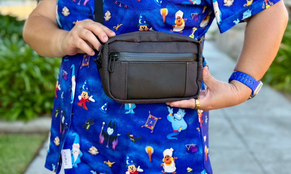 Waterfield Designs Shinjuku Sling in black being worn by a person.