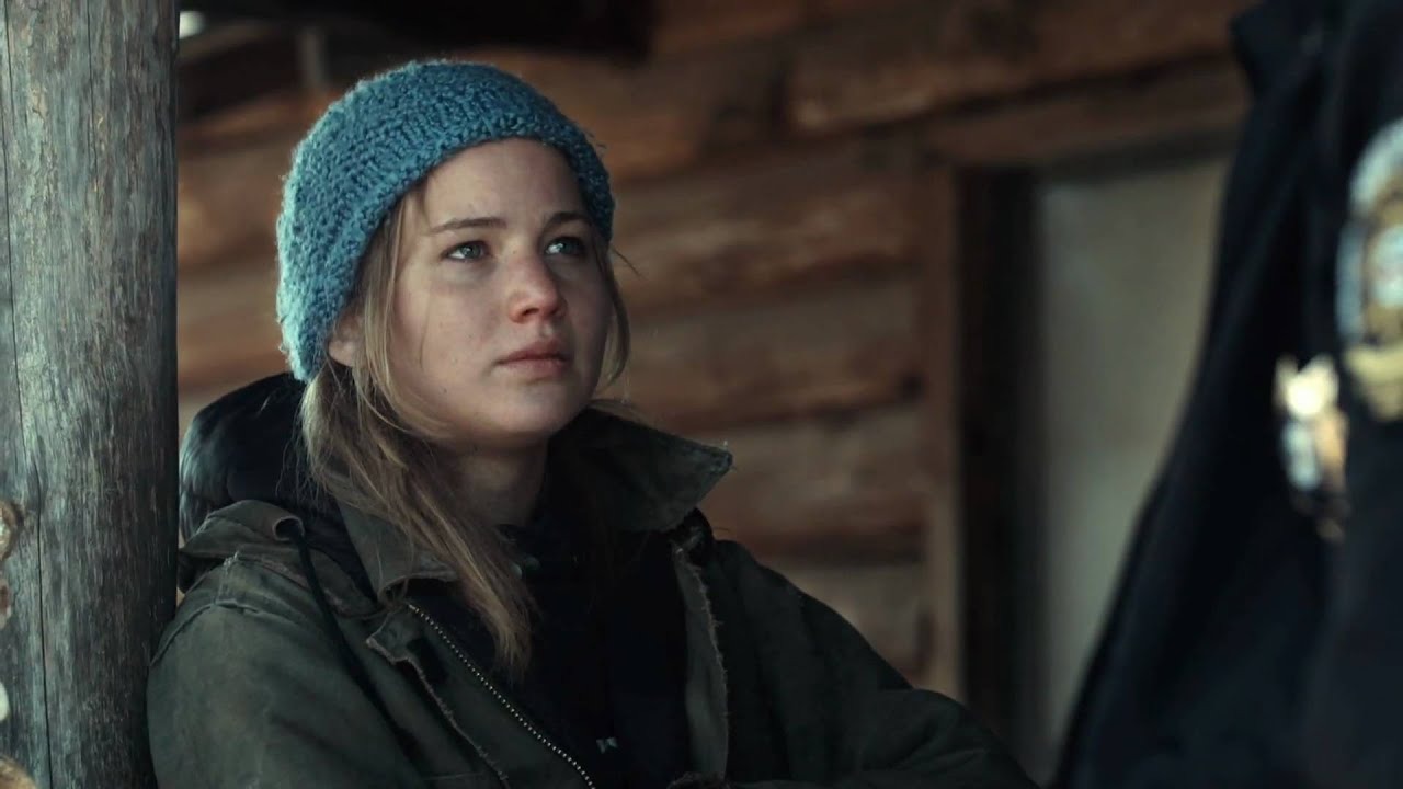 Jennifer Lawrence dans Winter's Bone portant une parka et un bonnet.