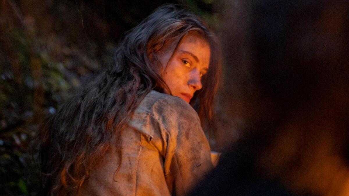 Alice Englert as Nevena #4 crouching and turning around in You Won't Be Alone.