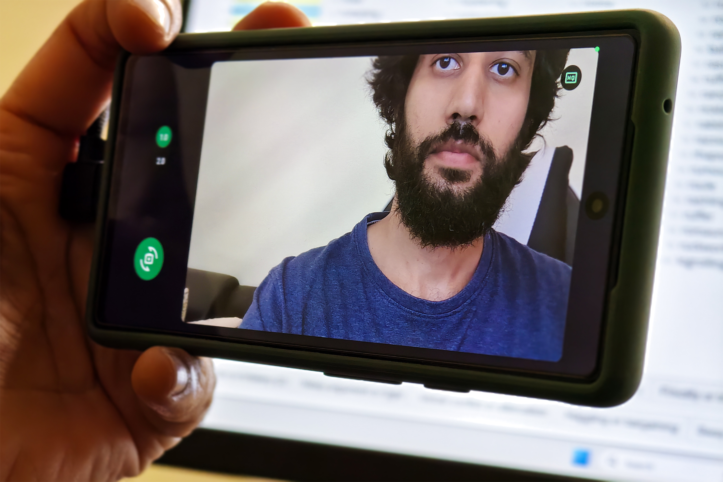 HQ webcam mode on Android 15 running on a Google Pixel 6a held in hand.