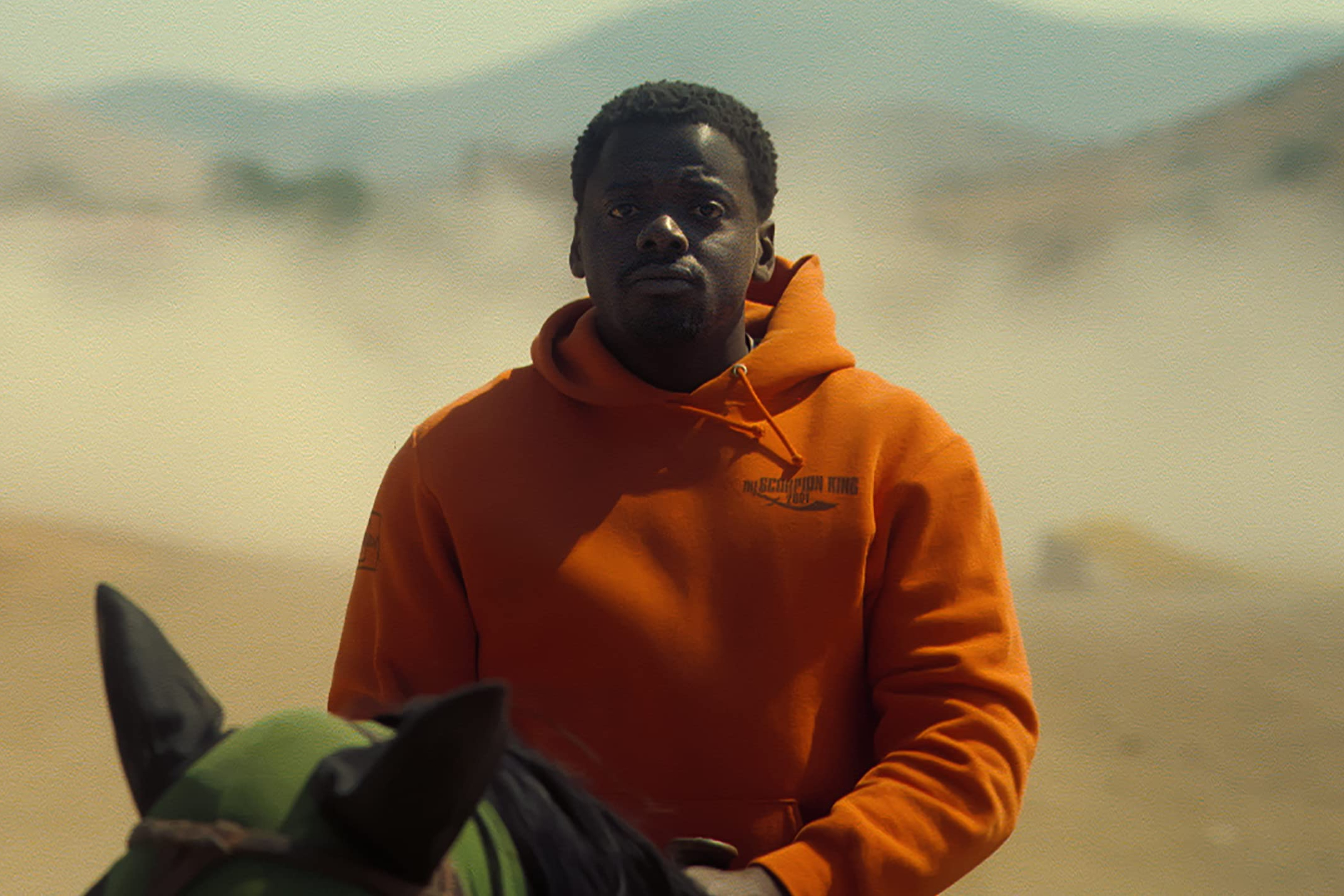 Daniel Kaluuya sitting on a horse in "No."