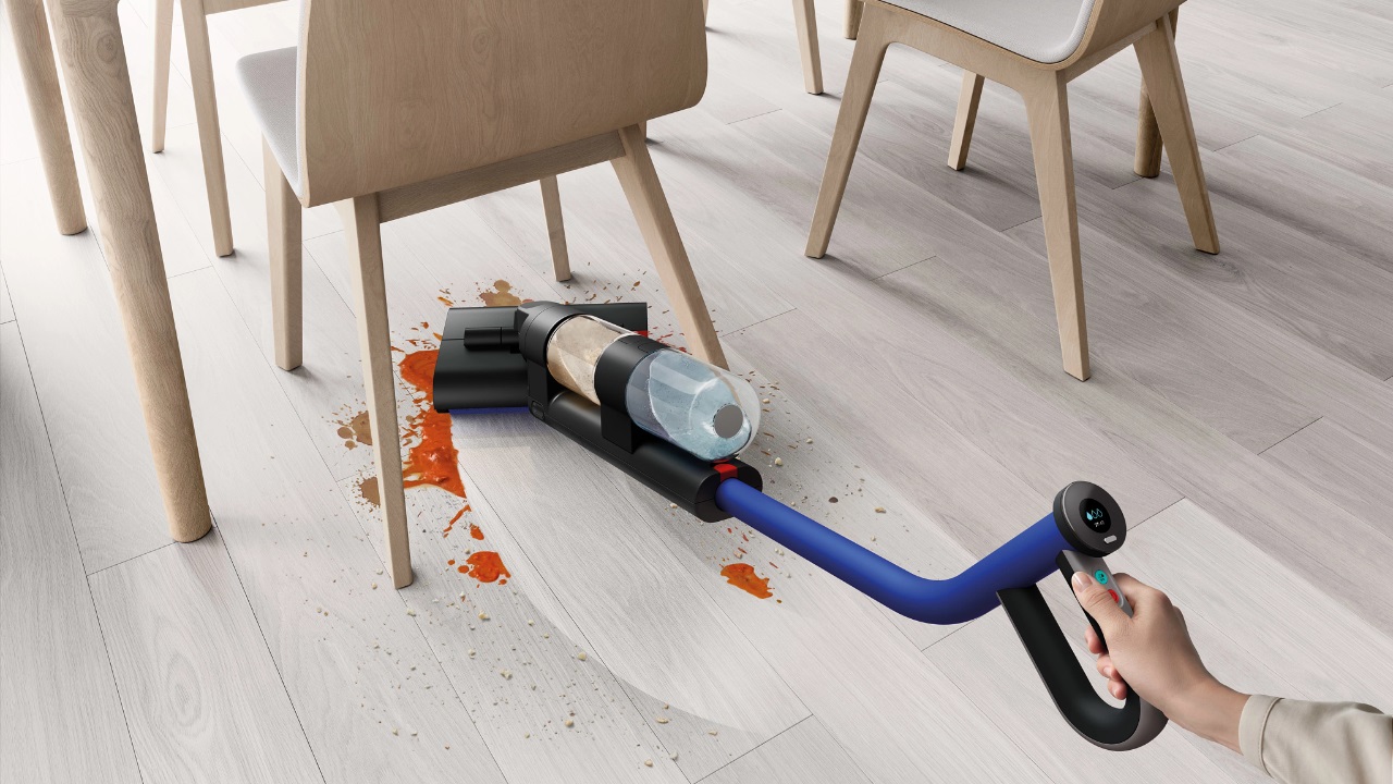 The Dyson WashG1 cleaning a spill.