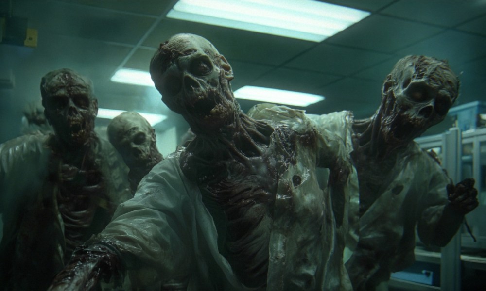 A group of zombies looking to onslaught locomotion toward camera.