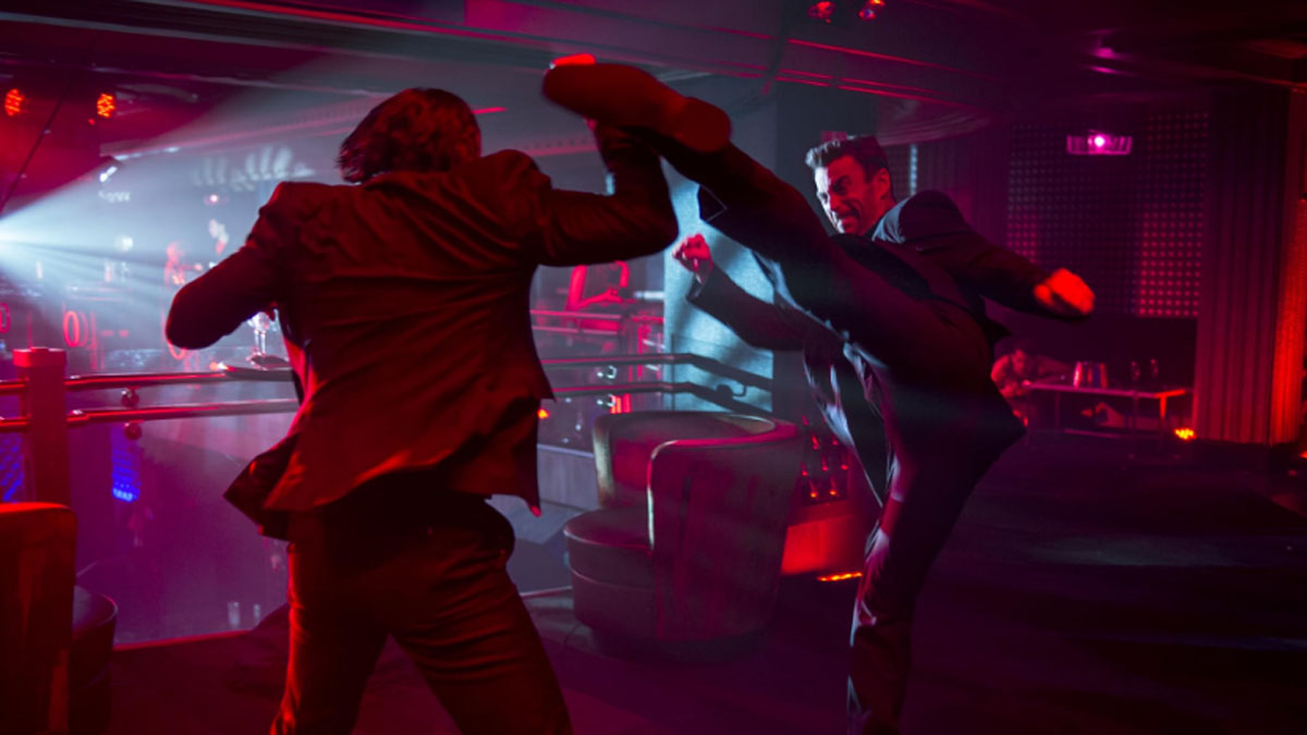 Keanu Reeves kicks a goon in John Wick.