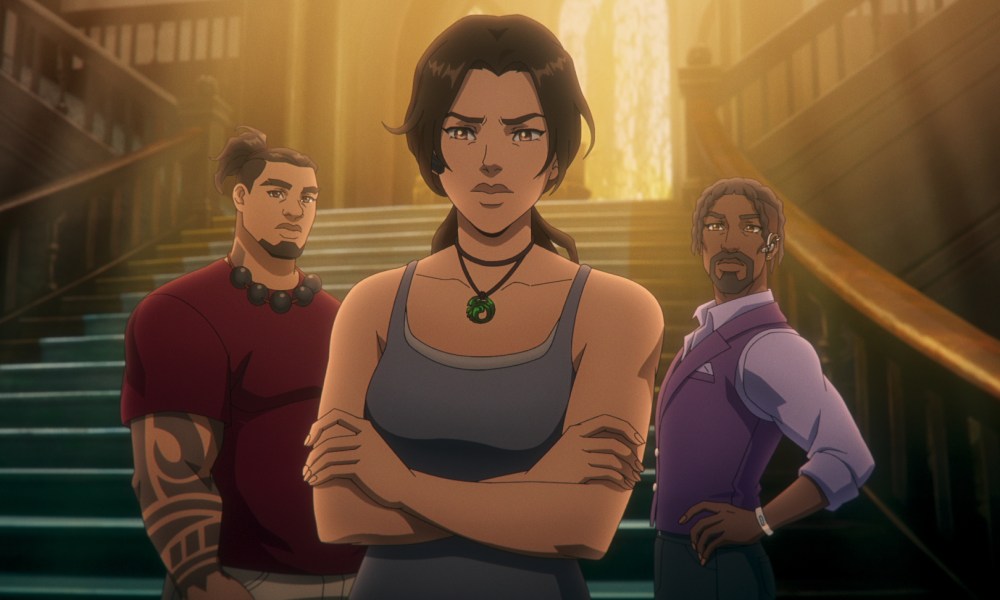 Jonah and Zip stand behind Lara in Tomb Raider: The Legend of Lara Croft.