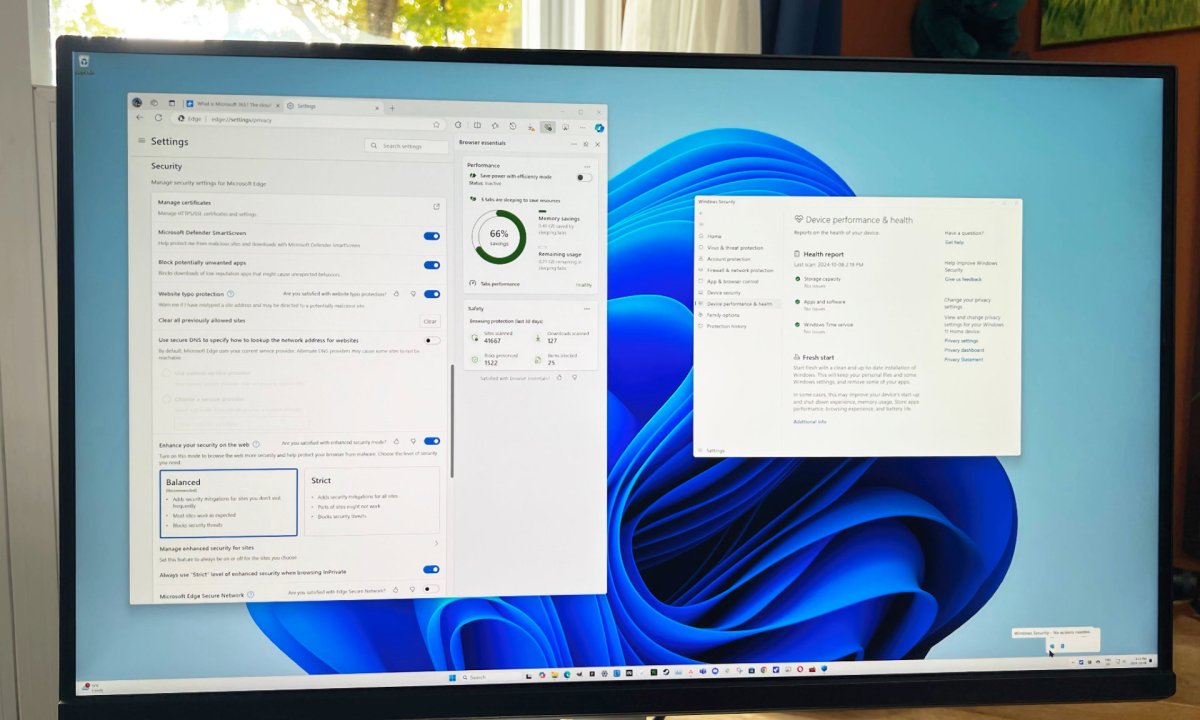 Microsoft Defender and Edge Security settings are open on a PC monitor.