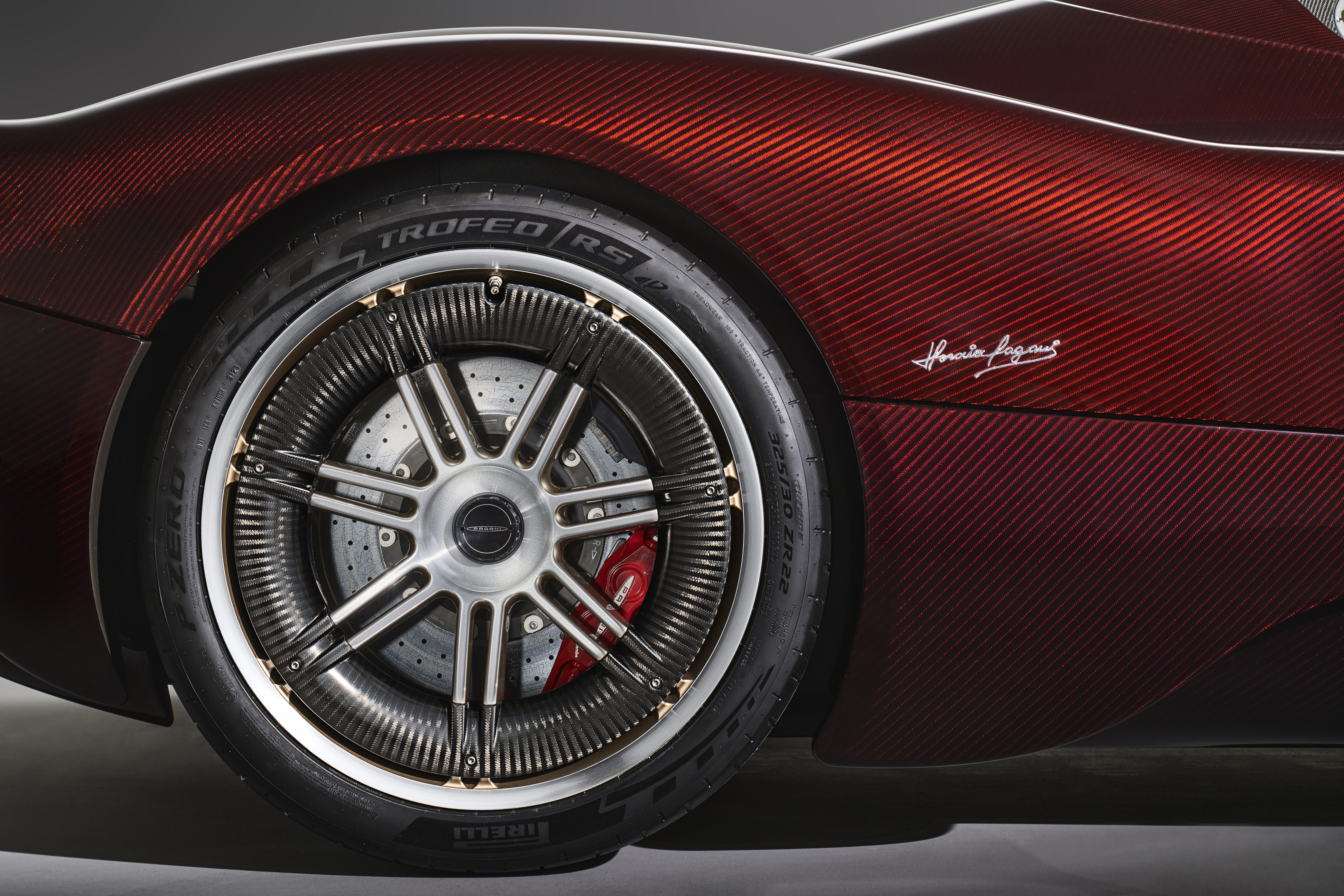 A Pirelli P Zero Trofeo RS at the back of a Pagani Utopia Roadster