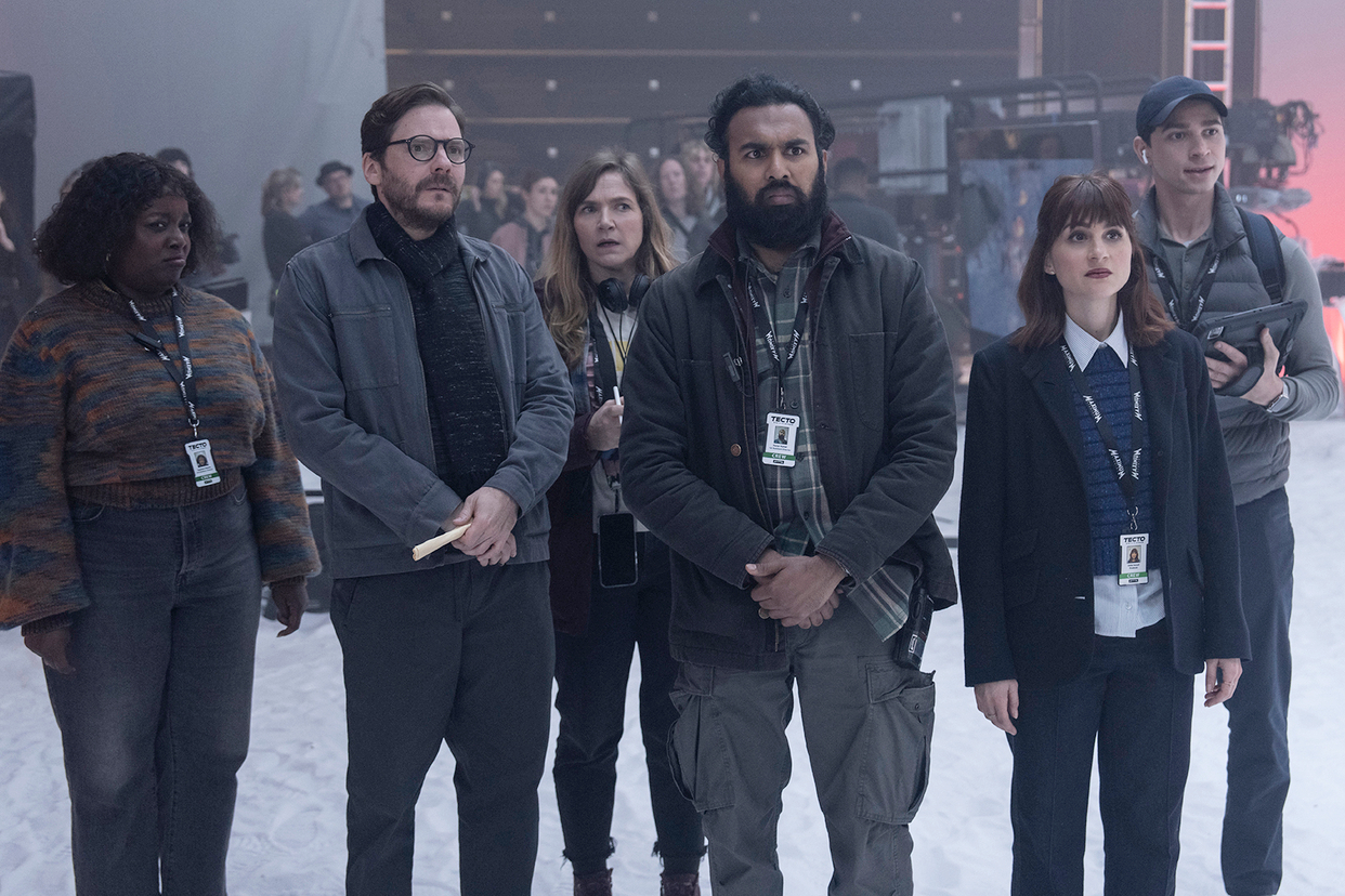 The Tecto crew stands on a snowy set in The Franchise.