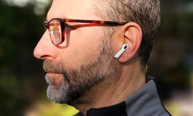 Simon Cohen wearing Apple AirPods 4.