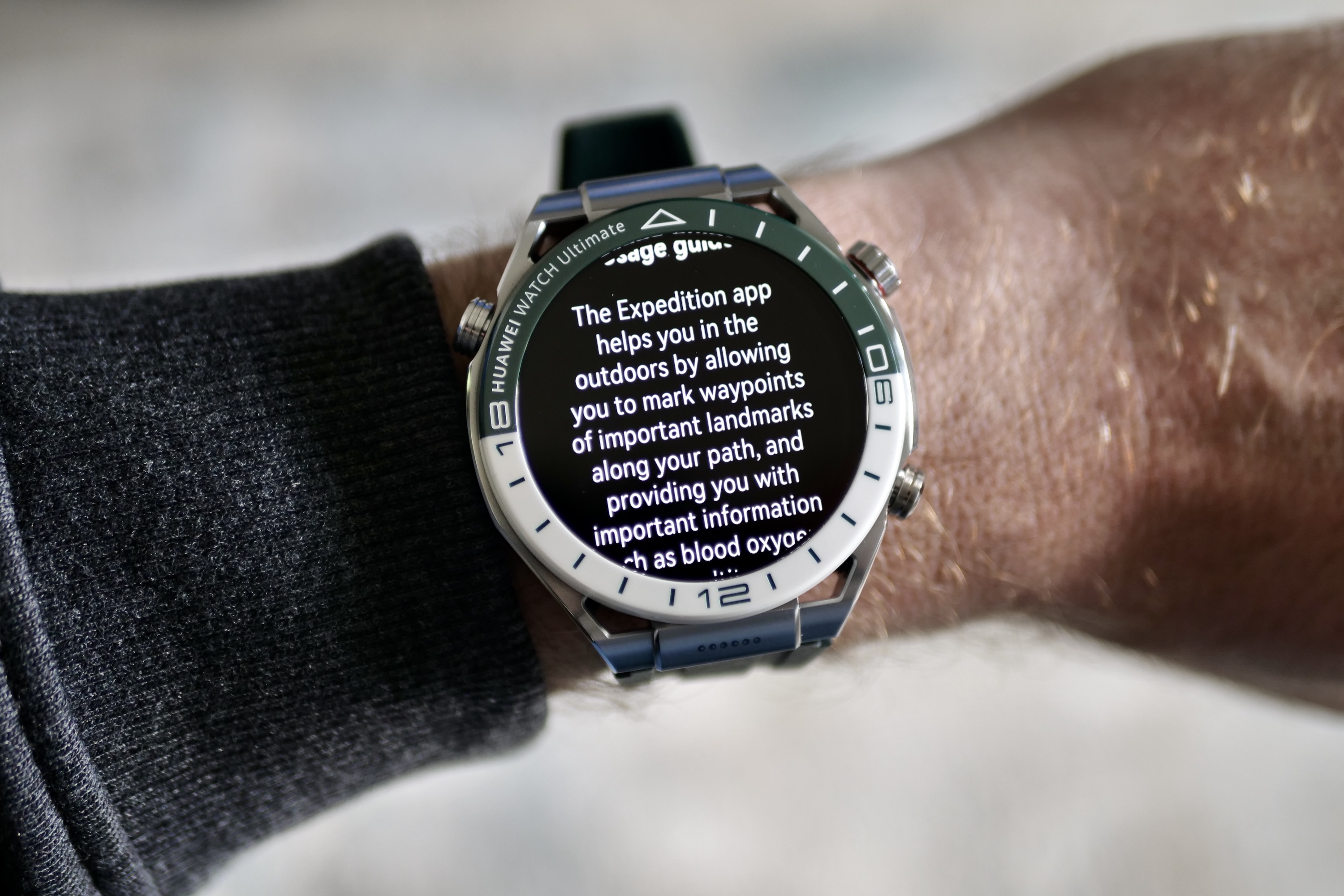 A person wearing the Huawei Watch Ultimate.