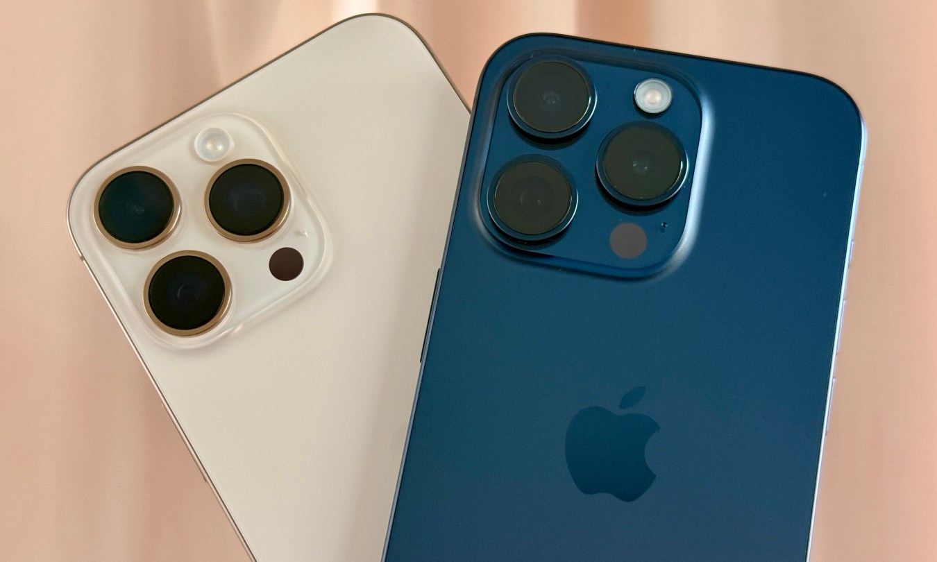 Natural Titanium iPhone 16 Pro Max (left) and a Blue Titanium iPhone 15 Pro.