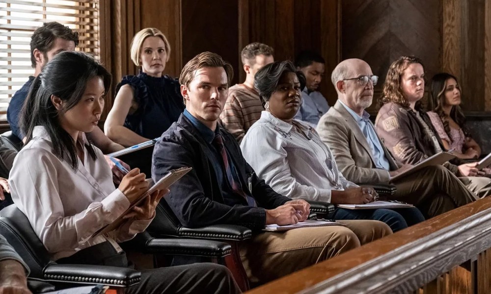 A man sits in a jury box in Juror No. 2.