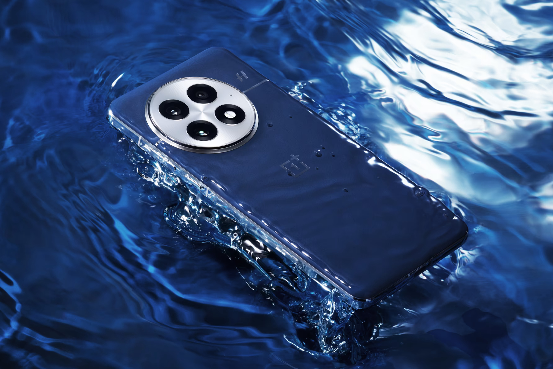 The blue OnePlus 13 in a pool of water.