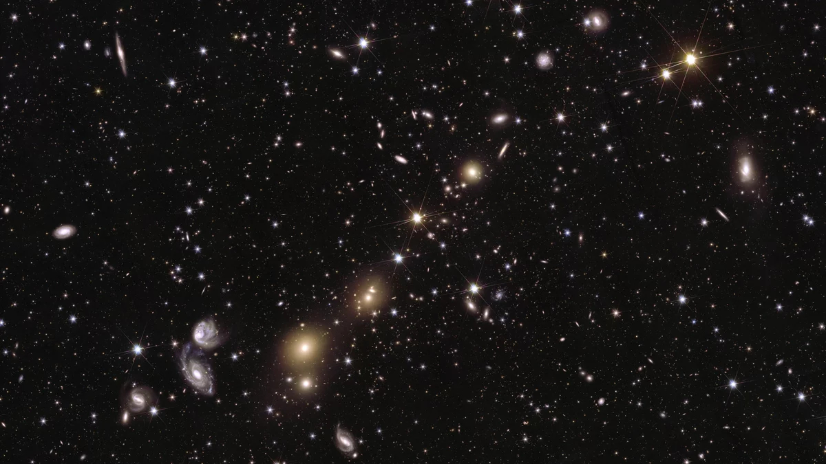 This image shows an area of ​​the mosaic released by ESA's Euclid Space Telescope on October 15, 2024. The area is zoomed in 36 times larger than the large mosaic. In this image you can see the nucleus of the galaxy cluster Abell 3381, 678 million light years away from us. The image shows many different galaxies of various shapes and sizes, from massive elliptical galaxies to modest spiral galaxies to tiny, faint dwarf galaxies.