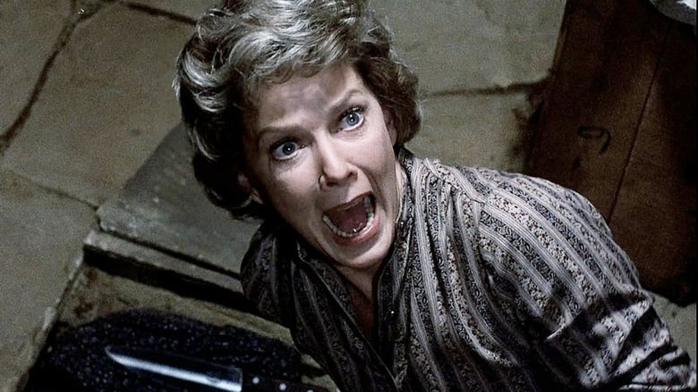 An old woman screams in Psycho II.