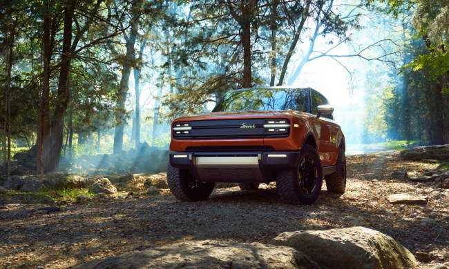 Scout Motors Traveler SUV in a forest