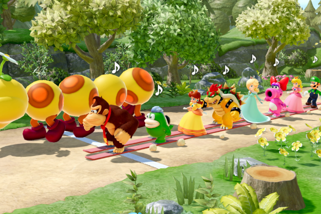 Donkey Kong and friends walk next to a Wiggler in Super Mario Party Jamboree.