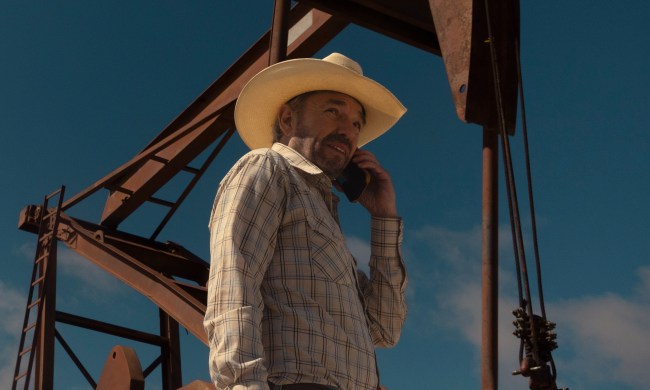 Billy Bob Thornton stands near an oil pump in Landman.