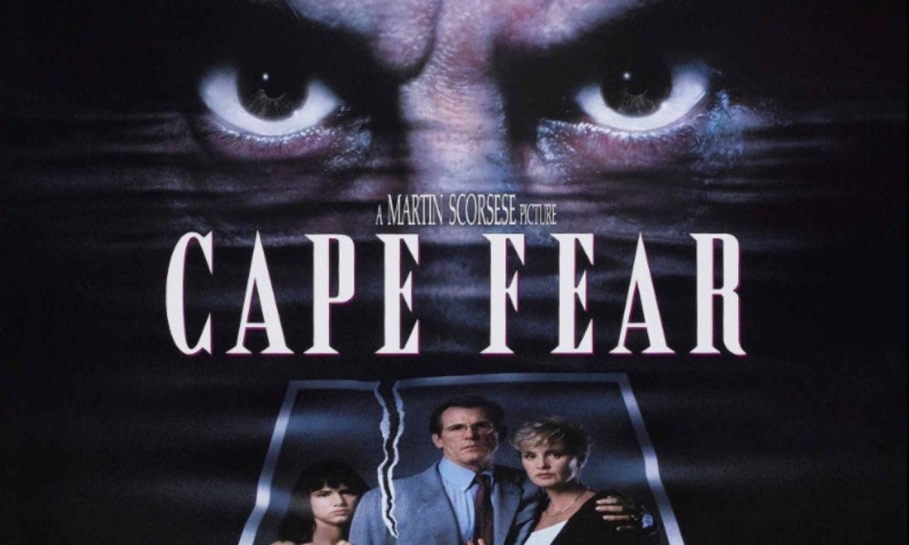 Robert De Niro's eyes hover over a family on Cape Fear poster.